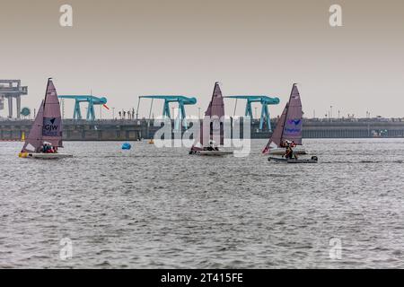 Sailing boats in front of the Cardiff Bay Barrage, South Wales Stock Photo