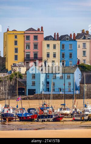 Fishing boats and colourful buildings in the seaside resort town of Tenby in Pembrokeshire, Wales Stock Photo