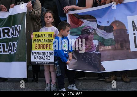 Istanbul, Turkey. 27th Oct, 2023. A protester holds a placard during the demonstration. After the Friday prayers, participants held a protest against Israel in front of the Taksim Mosque. Credit: SOPA Images Limited/Alamy Live News Stock Photo