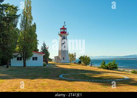 Cape Mudge town lighthouse by the Discovery Passage, Quadra Island, British Columbia, Canada. Stock Photo