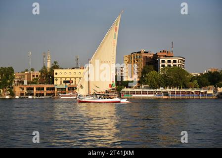 Felucca sailing boat on the Nile during a late summer afternoon in Luxor, Egypt. Stock Photo