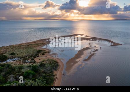 Aerial view of a coastal wetlands on the edge of an island at dawn at the Rhyll Inlet on Phillip Island in Victoria, Australia Stock Photo
