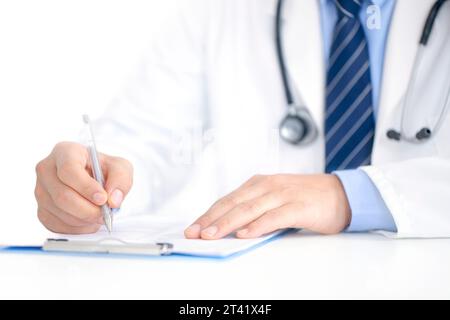 Doctor taking notes Stock Photo