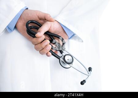 Doctor holding stethoscope Stock Photo