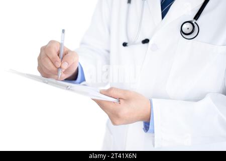Doctor taking notes Stock Photo