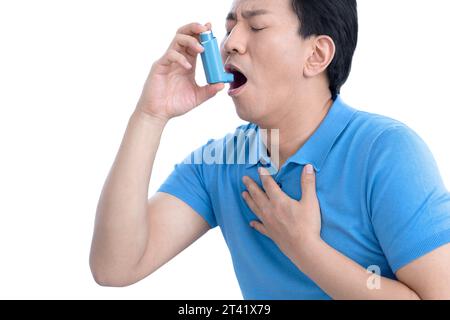 Man using inhaler Stock Photo