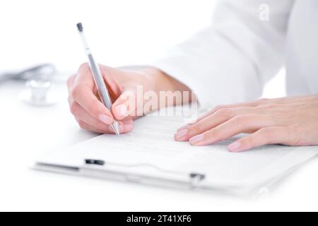 Doctor taking notes Stock Photo