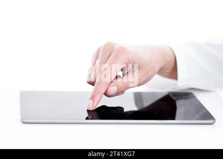 Doctor using digital tablet Stock Photo