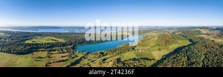Aerial panorama of Mindelsee, a glacial tongue lake on the Bodanrueck, on the horizon the western part of Lake Constance with the Mettnau peninsula Stock Photo