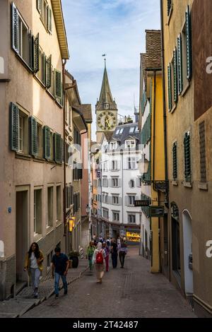 Narrow streets of the old town of Zurich, steeple of St. Peter's Church, Largest tower clock in Europe, Canton of Zurich, Switzerland Stock Photo