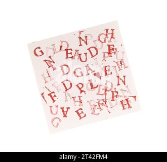 letters of the alphabet randomly printed on a sheet of paper on a transparent background Stock Photo