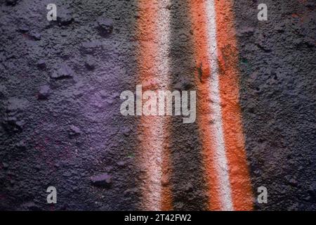 Red line on wall. Graffiti details. Painting on concrete. Painted surface. Stock Photo