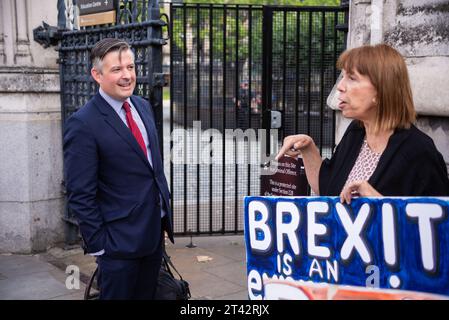 Jonathan Ashworth MP arriving as Parliament resumed after summer recess with debating on No Deal Brexit and prorogue. Pro Brexit protester Stock Photo