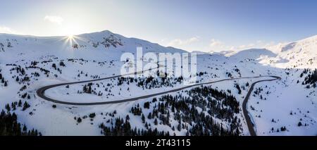 Sunset over Loveland Pass and mountain range in winter snow, Colorado, USA Stock Photo