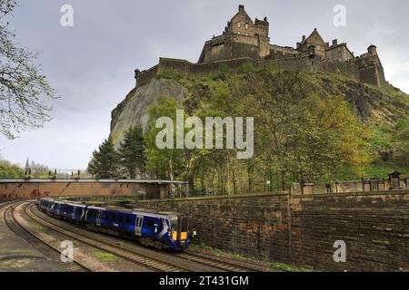 Scotrail 385033 leaving Edinburgh Waverley station; Edinburgh City, Scotland, UK Stock Photo