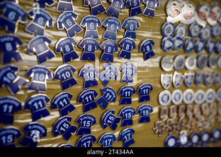 Pin badges for sale ahead of the Premier League match between Chelsea and Brentford at Stamford Bridge, London. Picture date: Saturday October 28, 2023. Stock Photo