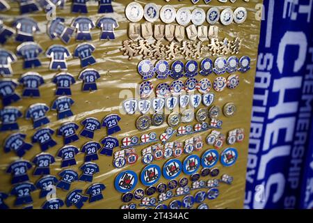 Pin badges for sale ahead of the Premier League match between Chelsea and Brentford at Stamford Bridge, London. Picture date: Saturday October 28, 2023. Stock Photo