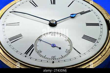 NZ7 0952 Pocket watch magnified with large white face and roman dials Stock Photo