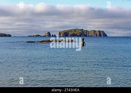 A view of the Time and Tide Bell installed in the tidal Bosta Beach on Great Bernera in the Isle of Lewis in the Outer Hebrides, Scotland. Stock Photo