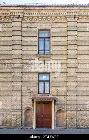 Old brick building with wooden windows Stock Photo - Alamy