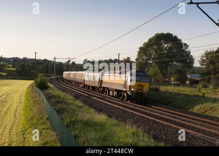 West Coast railways class 57 locomotive 57313 hauling the Northern belle luxury dining train on the west coast mainline in Cumbria Stock Photo