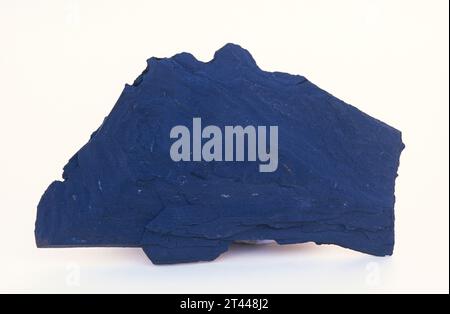 Slate is a foliated metamorphic rock. Sample. Stock Photo