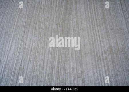 Close-up of textured concrete surface with green steel bands used for ...