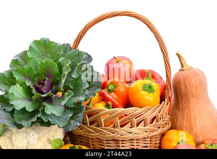 Fruits and vegetables in basket isolated on white Stock Photo