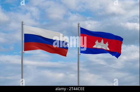 Cambodia and Russia flags waving together on blue cloudy sky, two country relationship concept Stock Photo