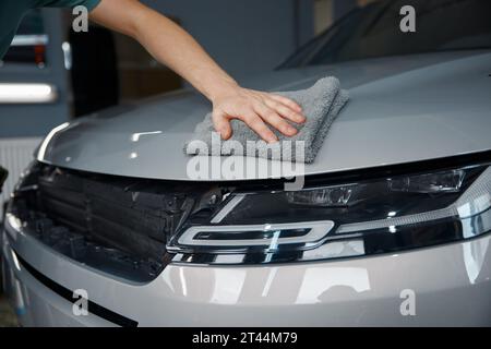 Process of polishing car body after polymer protective outer covering Stock Photo