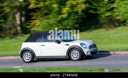Milton Keynes,UK - Oct 28th 2023:2014 white Mini One car driving on an English road Stock Photo