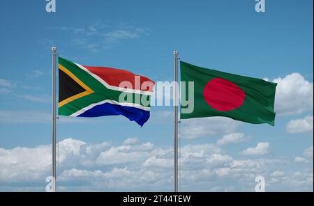 Bangladesh and South Africa flags waving together on blue cloudy sky, two country relationship concept Stock Photo