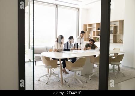 Multiethnic business team with female leader brainstorming on creative ideas Stock Photo