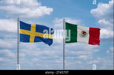 Mexico and Sweden flags waving together on blue cloudy sky, two country relationship concept Stock Photo