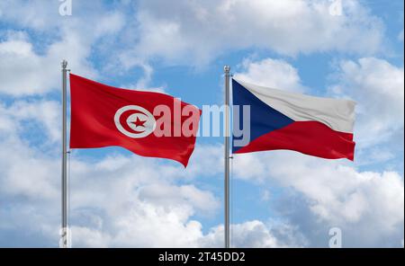 Czech Republic and Tunisia flags waving together on blue cloudy sky, two country relationship concept Stock Photo