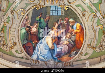 GENOVA, ITALY - MARCH 8, 2023: The fresco of death of St. Roch in the church Chiesa di San Rocco sopra Principe Stock Photo