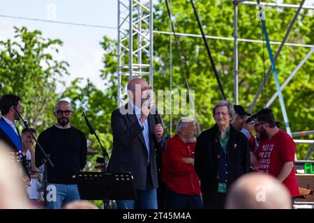 Gattatico, Reggio Emilia, Italy - April 25, 2023: Stefano Bonaccini Governor of the Emilia Romagna Region speaking with the audience during the Libera Stock Photo