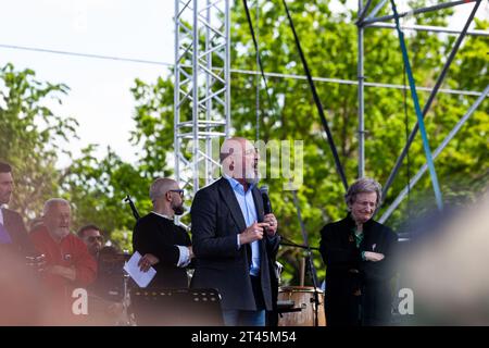 Gattatico, Reggio Emilia, Italy - April 25, 2023: Stefano Bonaccini Governor of the Emilia Romagna Region speaking with the audience during the Libera Stock Photo