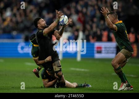 New Zealand's number eight Ardie Savea (R) is tackled by South Africa's hooker Deon Fourie (L) and South Africa's right wing Kurt-Lee Arendse (TOP) during the France 2023 Rugby World Cup Final between New Zealand and South Africa at the Stade de France in Saint-Denis, on the outskirts of Paris, on October 28, 2023.Photo by Eliot Blondet/ABACAPRESS.COM Credit: Abaca Press/Alamy Live News Stock Photo