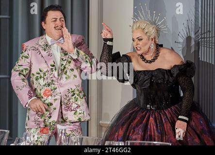 Hamburg, Germany. 25th Oct, 2023. Performers John Daszak as Herod and Violeta Urmana as Herodias are on stage during the photo rehearsal for the opera 'Salome' by Richard Strauss at the Hamburg State Opera. Premiere is on 29.10.2023 at 6 pm. Credit: Georg Wendt/dpa/Alamy Live News Stock Photo