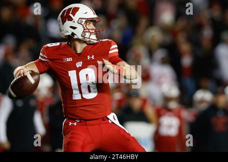 Wisconsin Badgers Quarterback Braedyn Locke (18) Looks For A Receiver ...