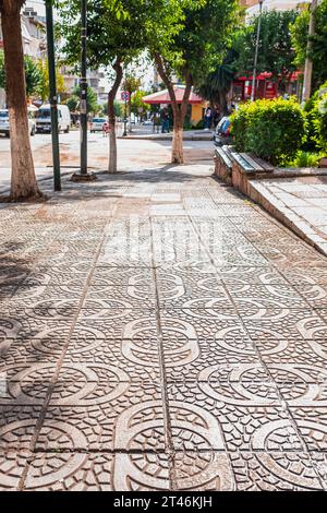 Stamped concrete pavement cobblestones pattern, decorative appearance colors and textures of paving cobblestones tile on cement flooring in a city par Stock Photo