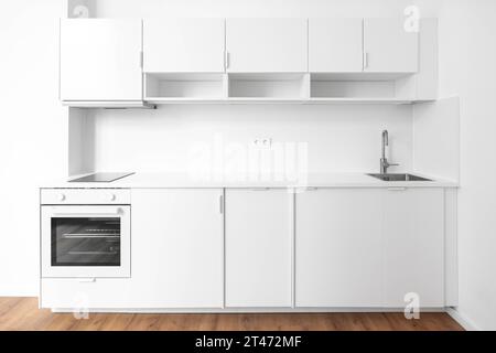 build in kitchen or kitchenette in new apartment room Stock Photo