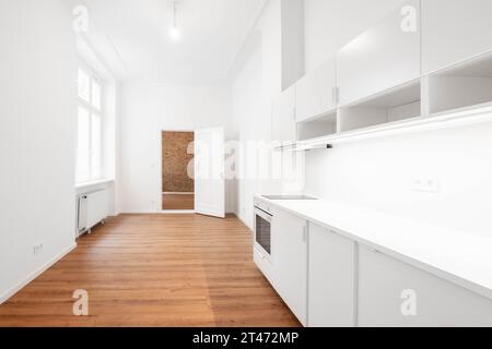 Kitchen Interior At Home Or Small Office Red Tile Wall And White Shelf  Cabinet Doors With Text Labels Glass Jars With Coffee Tea Sugar Plates And  Cups On Dish Rack Different Cooking