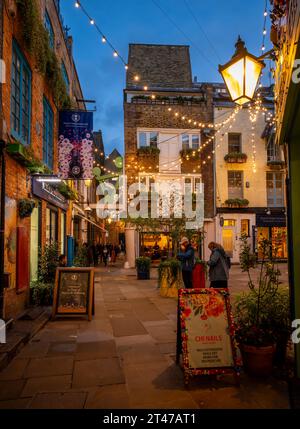 London, UK: Neal's Yard in the Covent Garden area of central London. A beautiful old courtyard with small shops, cafes and restaurants. Stock Photo