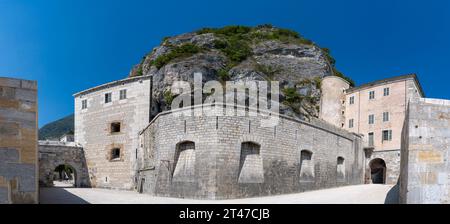 View of the upper fort courtyard and the rock behind Stock Photo