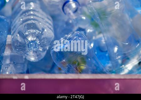 Plastic bottles of water are stored in a recycling center Stock Photo