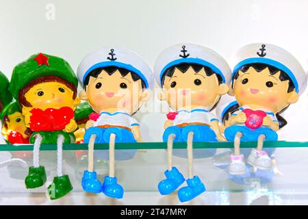 cartoon characters Chinese women soldiers formative dolls on the store shelves Stock Photo