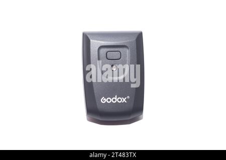 Moscow, Russia, October 20, 2023:. Godox Camera flash trigger isolated on white background. Stock Photo