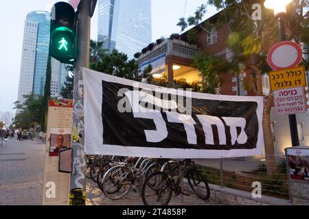 Tel Aviv, Israel - OCT 28, 2023 - Israeli civilians gathered in solidarity for ceasefire between Israel and Gaza, holding banners for the missing and Stock Photo